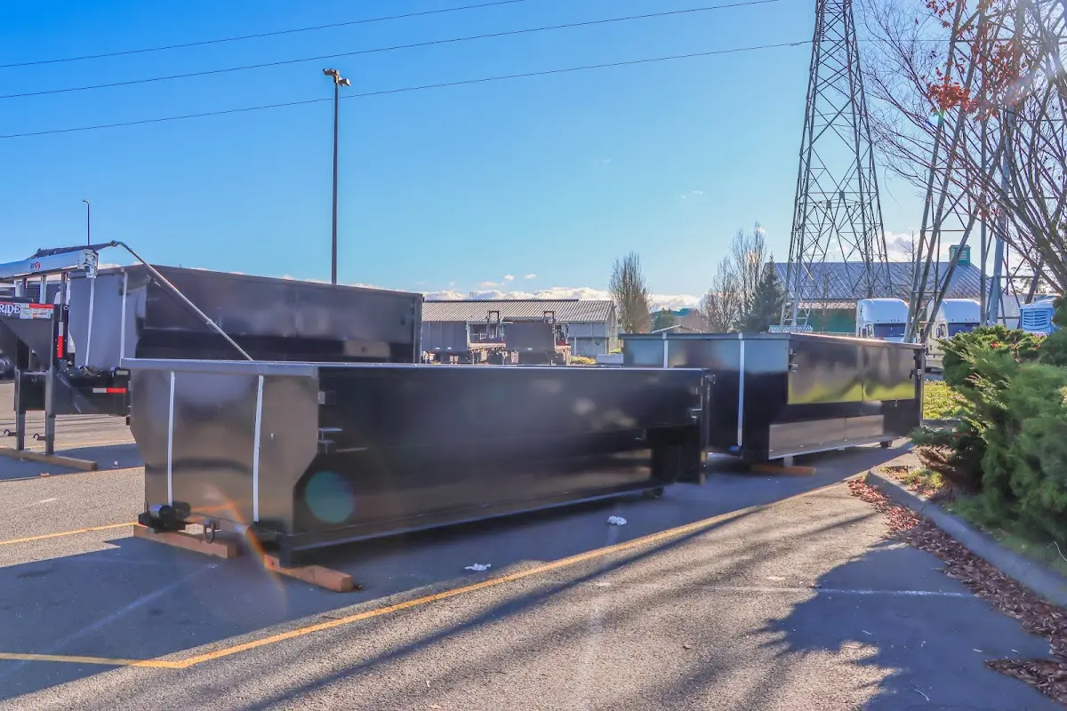 Roll-off dumpster ready for waste disposal at job site for 12 Yard Dumpster Rental in Cornelius
